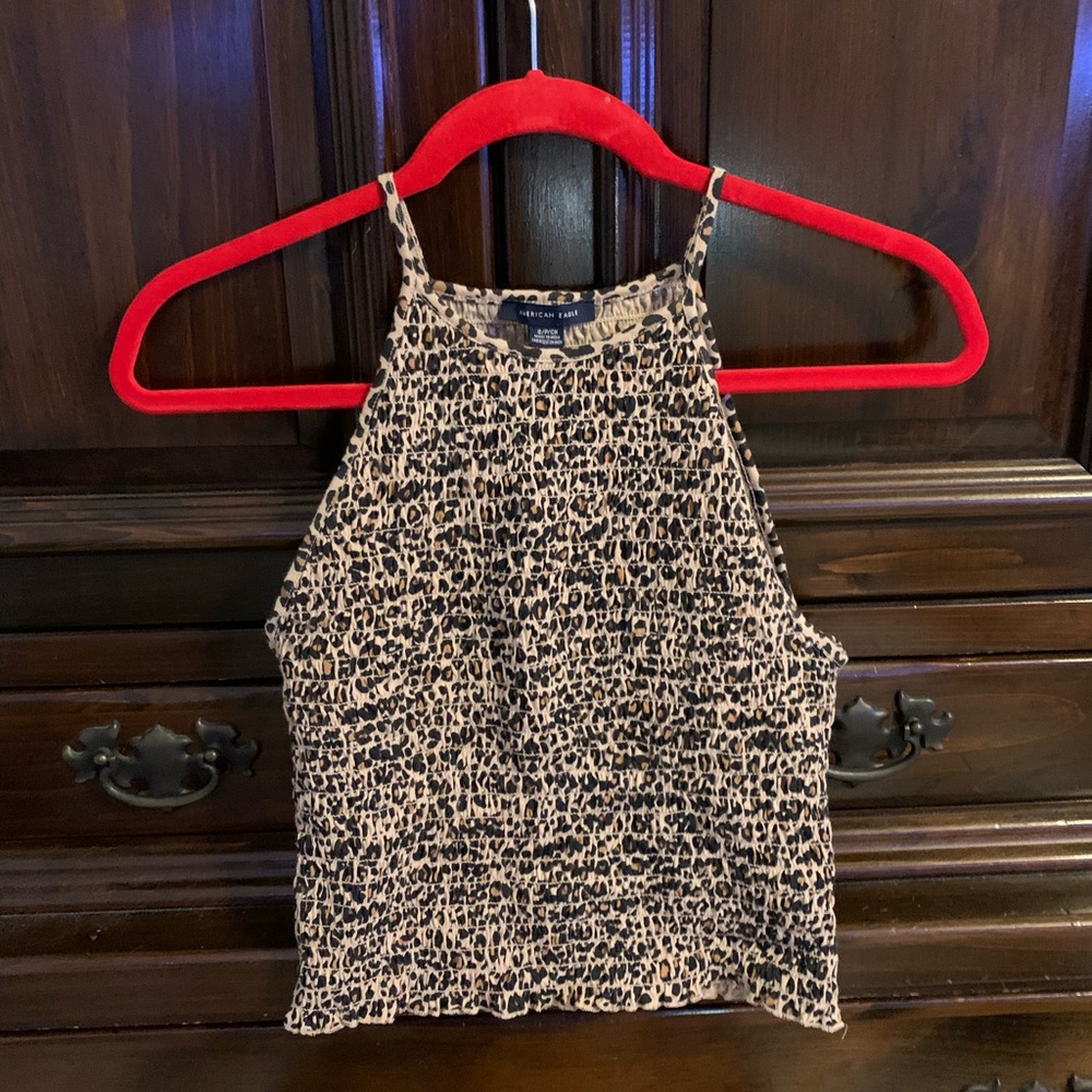 Never worn (tag still on) halter cheetah print top